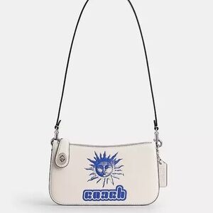 Coach White Leather Shoulder Bag with Blue Sun Motif